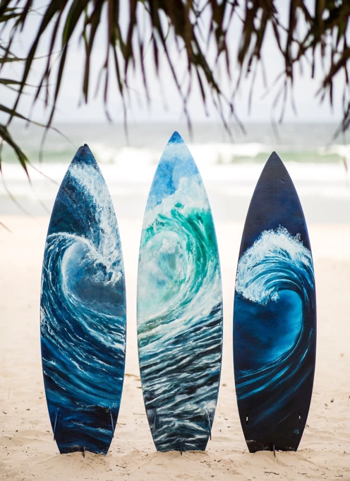 Painted Surfboards on the Beach